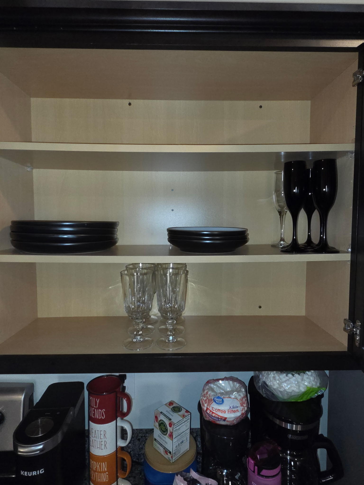 Coffee station with mugs and supplies