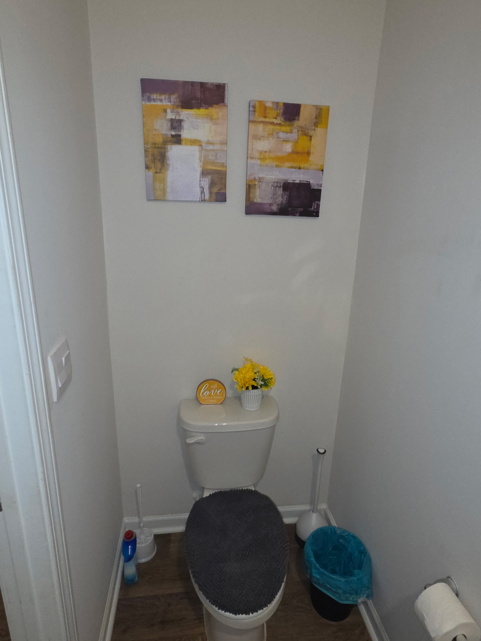 Half bathroom with wall art