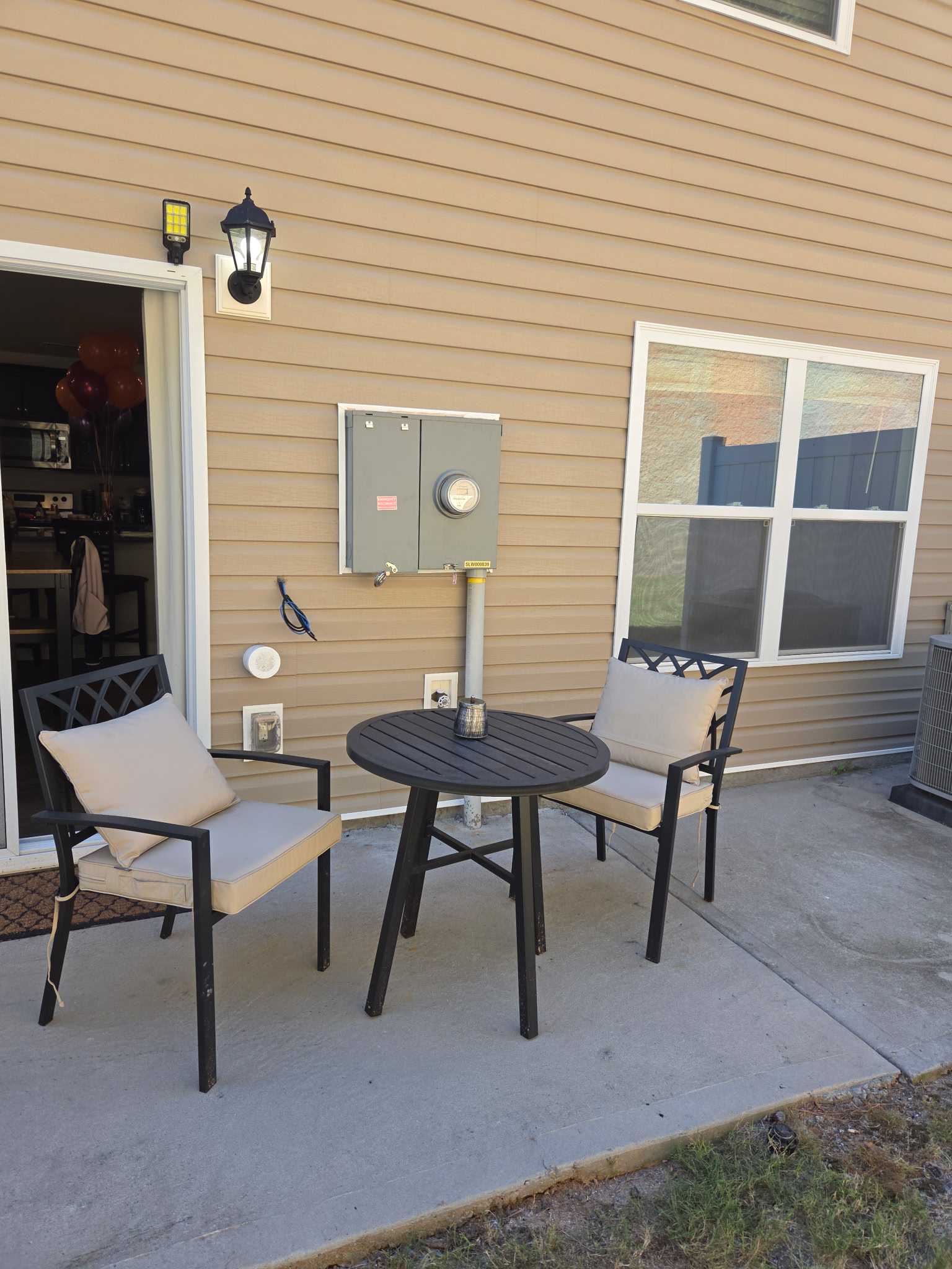 Patio table and seating outside the townhouse