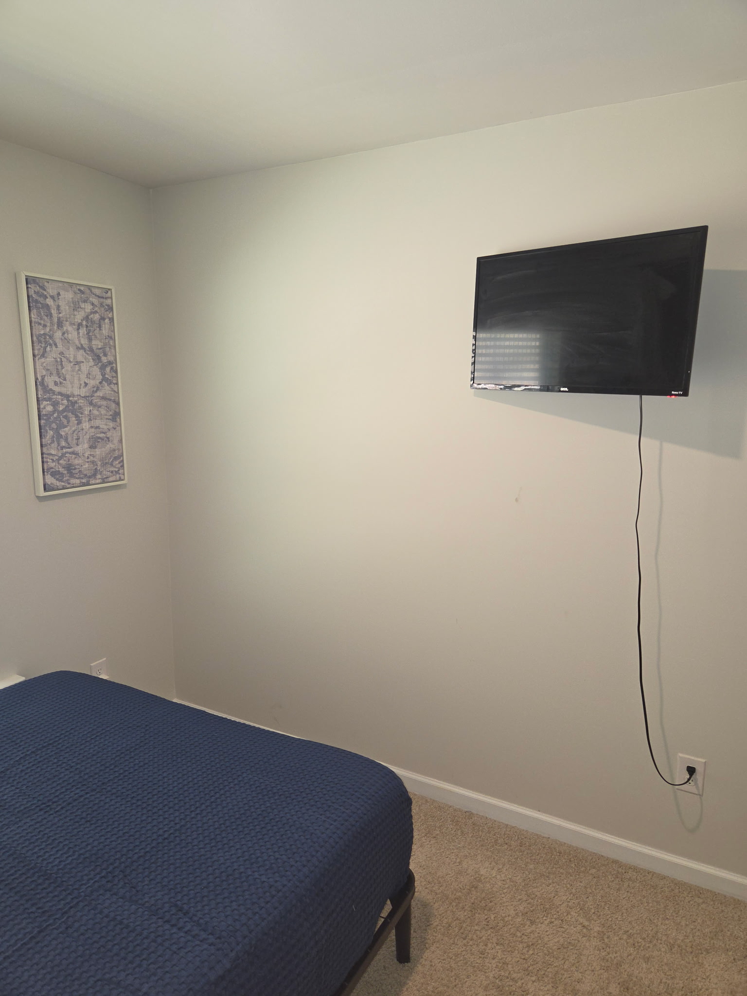 Bedroom wall with television