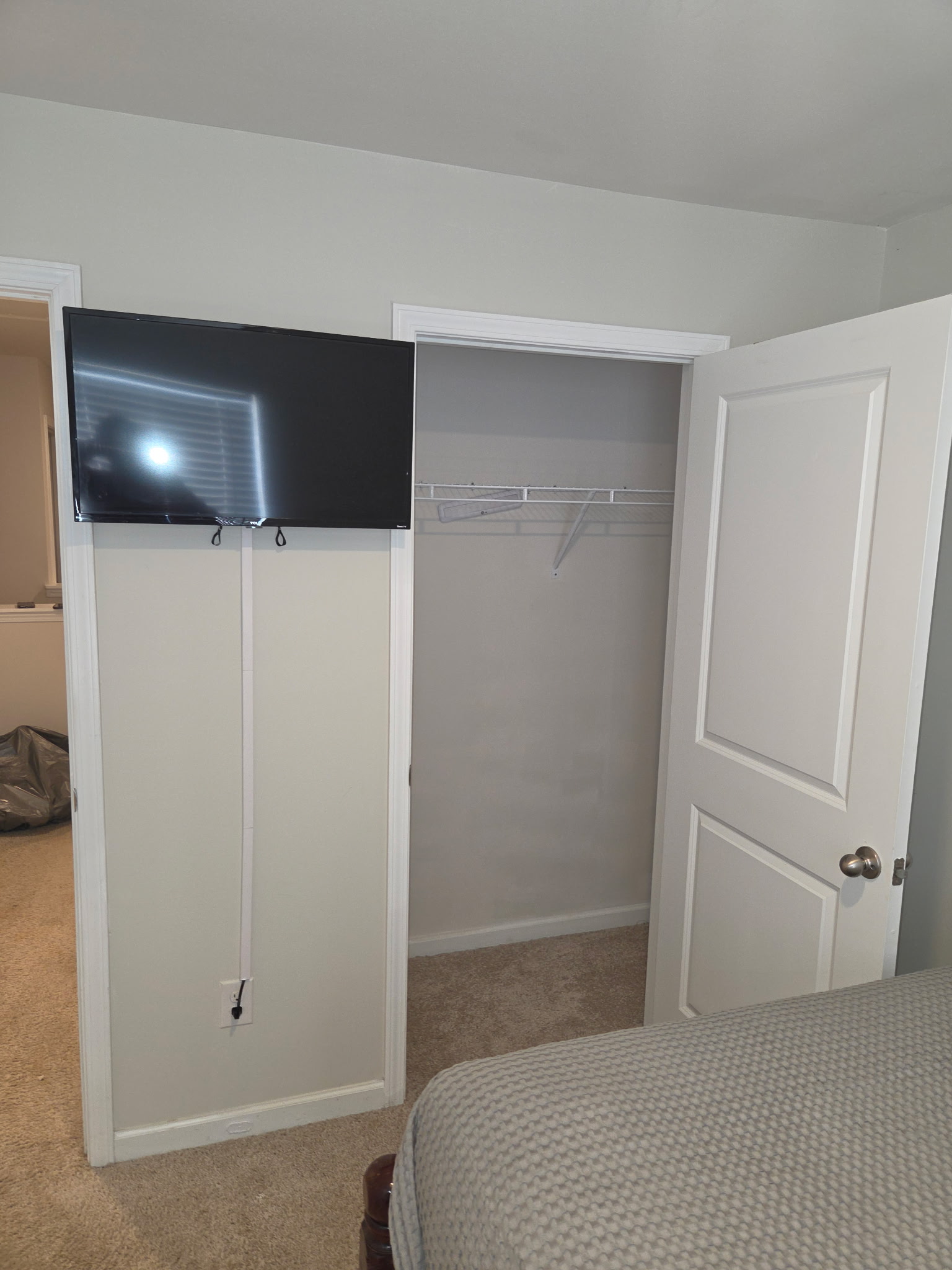 Guest bedroom closet and television