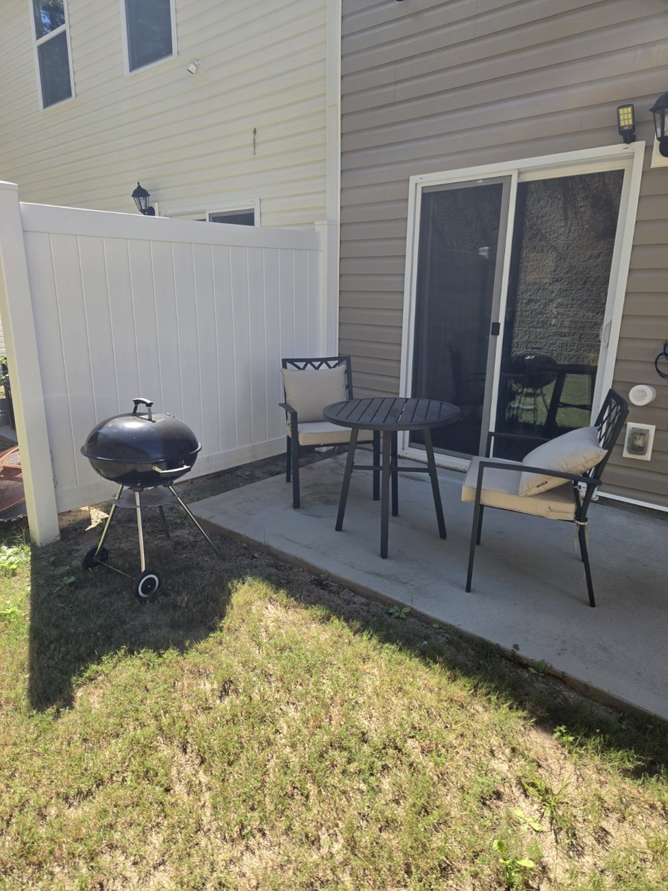 Patio seating and charcoal grill